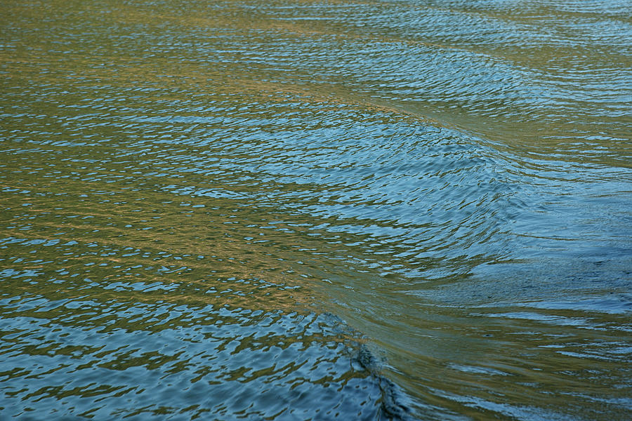 Ripple on water Photograph by Kiran Joshi