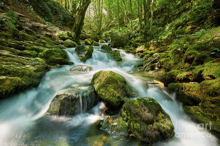 River flowing through rocks Photograph by Ragnar Lothbrok