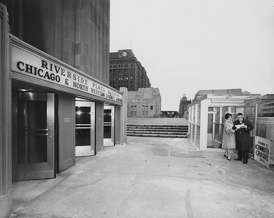 Couple at Chicago and North Western Railway Terminal - 1962 Photograph by Chicago and North Western Historical Society