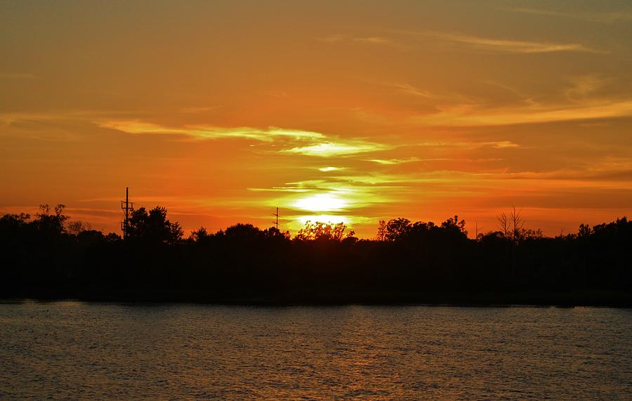Riverfront Sunset Photograph by Cynthia Guinn