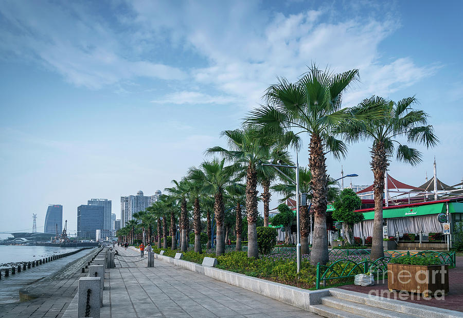 Riverside Promenade Park And Skyscrapers In Downtown Xiamen City Photograph by JM Travel Photography