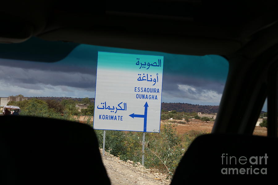 Road Sign to Essaouira  Photograph by Chuck Kuhn