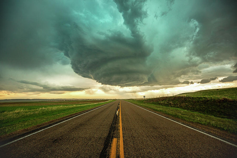 Road Trip - Storm Twists Above Road in Western Nebraska Photograph by ...