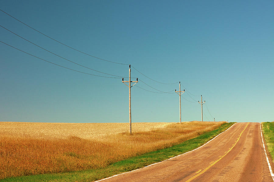 Roadside Poles Photograph by Todd Klassy