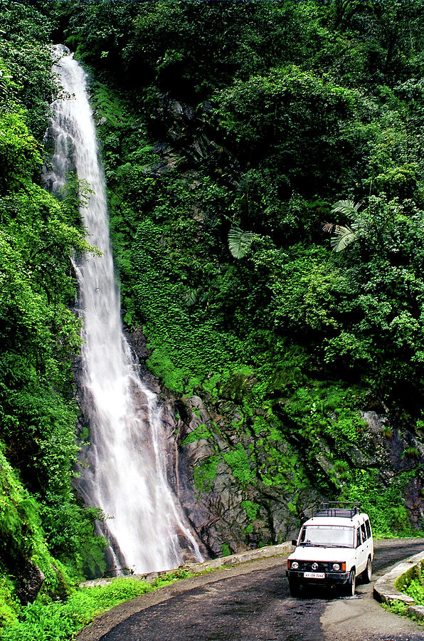 Nature Photograph - Roadside waterfall in the mountains of Arunachal Pradesh, India by Misentropy