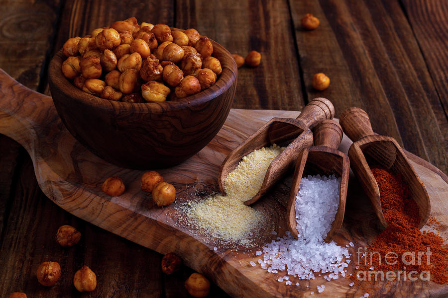Roasted Spicy Chickpeas On Rustic Background Photograph