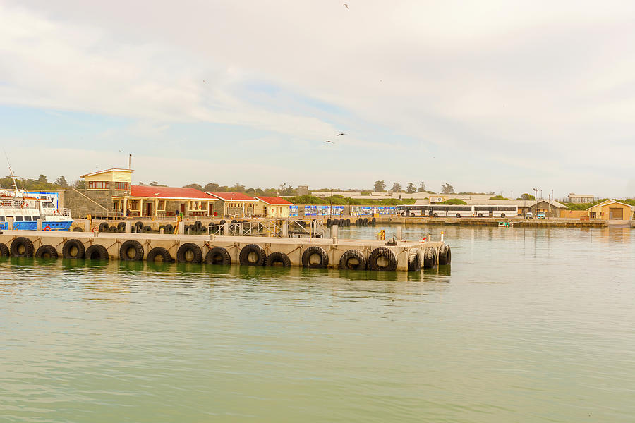 Robben Island dock, as seen from ferry boat, Cape Town, South Af Photograph by Marek Poplawski