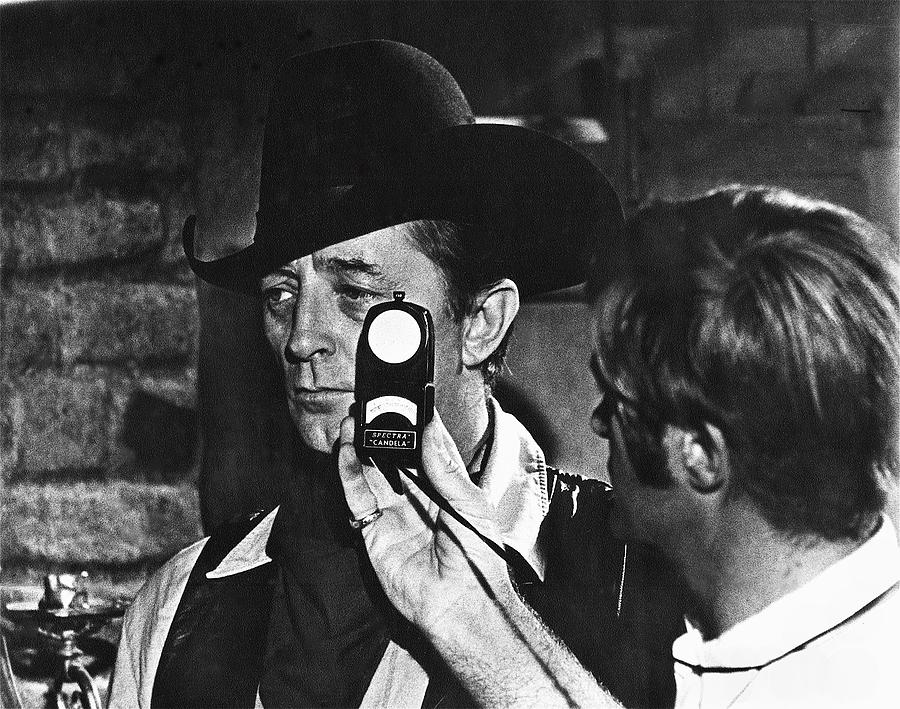 Robert Mitchum cinematographer Harry Stradling, Jr. Young Billy Young set Old Tucson AZ 1968 Photograph by David Lee Guss