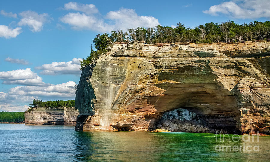 Rock Arches and Sea Caves of Pictured Rock National Shoreline Photograph by Karen Jorstad