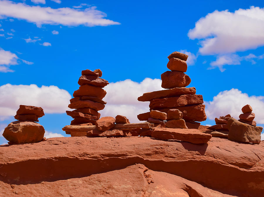 Rock Cairns in the Desert Photograph by Dany Lison