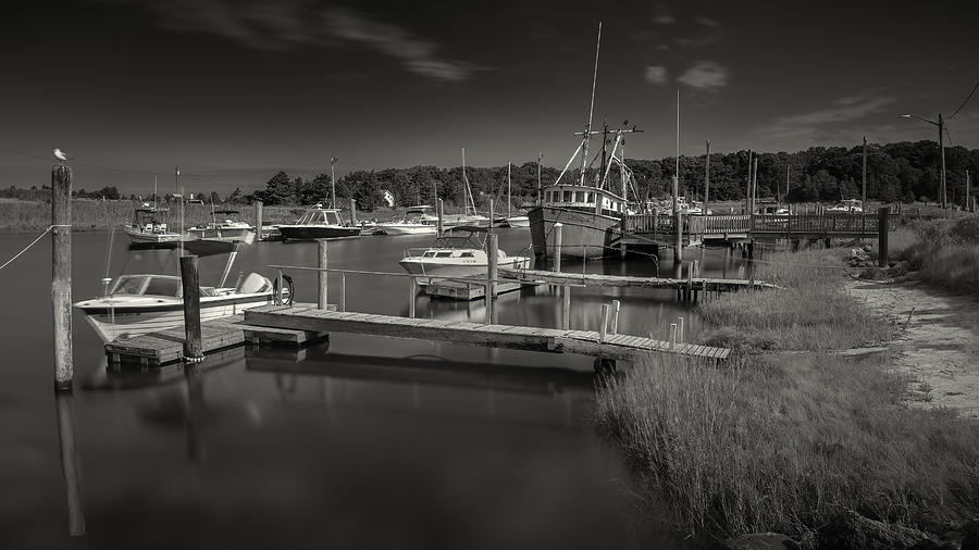 Rock Harbor Fishing Boats Black and White Photography Photograph by Darius Aniunas