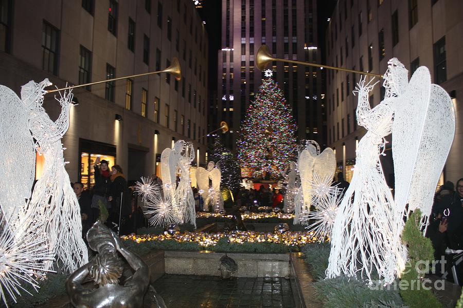Rockefeller Center Snow Angels And Christmas Tree At Night Photograph by John Telfer