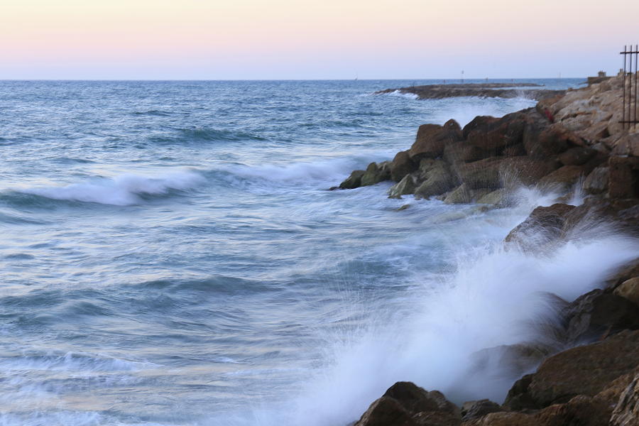 Rocks And Waves. Photograph by Shlomo Zangilevitch