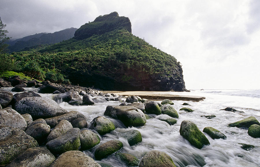 Beach Photograph - Rocks on a Beach Hanakapiai Beach Na Pali Coast Kauai Hawaii by George Oze
