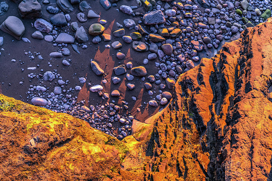 Rocks on sand at San Juan de Gaztelugatxe Photograph by Judith Barath