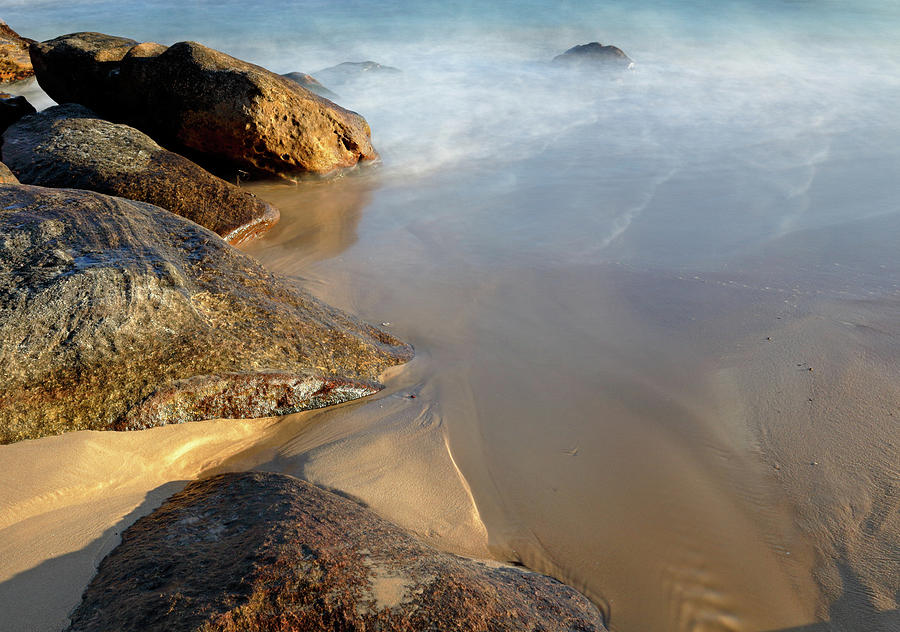 Rocks, Sand and Water Photograph by Nicholas Blackwell