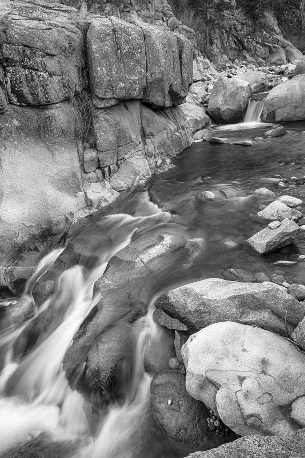 Rocky Mountain Canyon Streaming In Black And White Photograph
