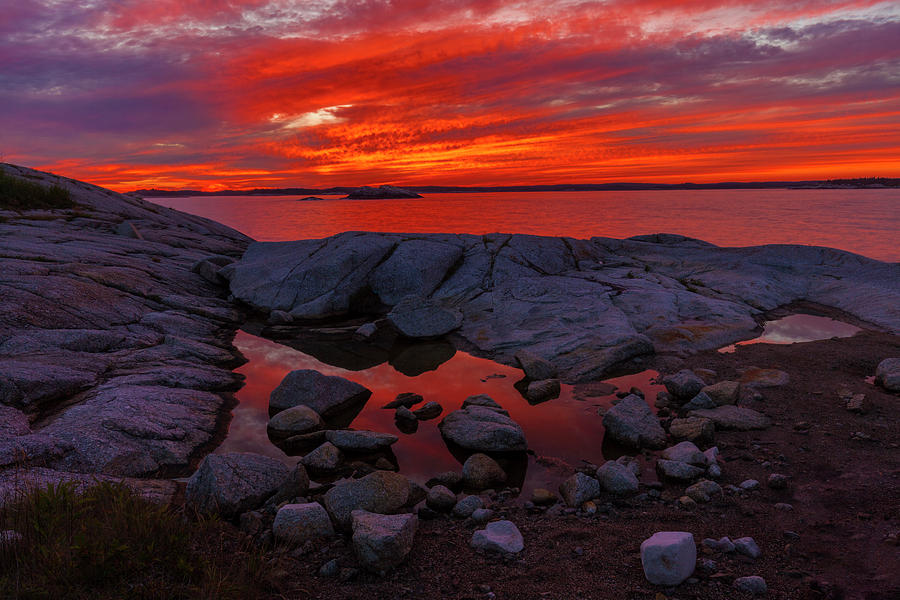 Rocky Shoreline at Sunset Photograph by Irwin Barrett