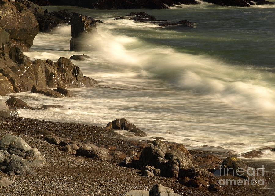 Rocky Shores  Photograph by Raymond Earley