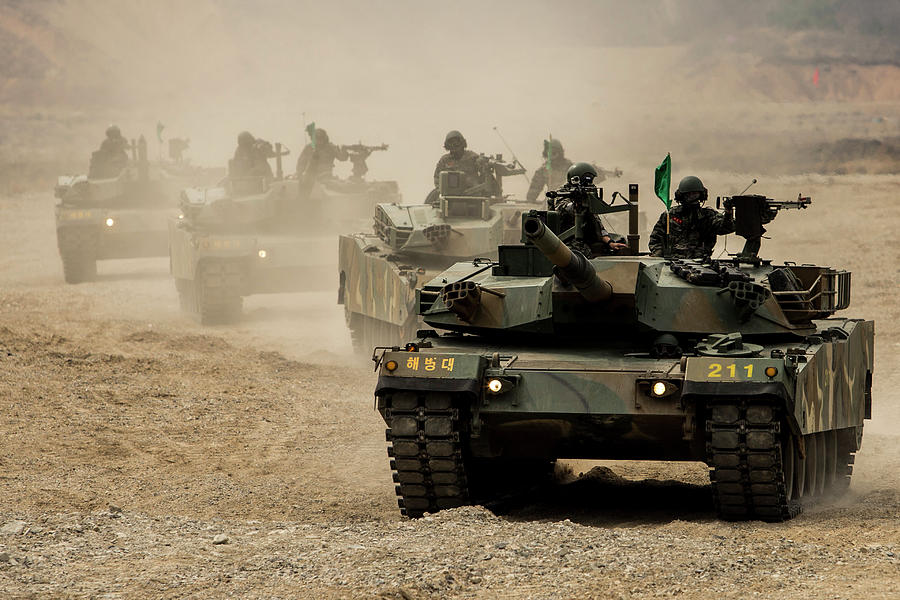 ROK tanks head off firing line in formation during Korea Marine Exercise Program Photograph by Paul Fearn
