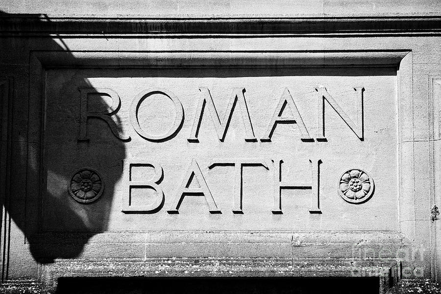 roman bath sign on old bath stone wall Bath England UK Photograph by ...