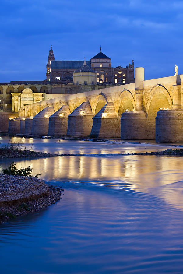 Architecture Photograph - Roman Bridge on Guadalquivir River at Dawn by Artur Bogacki