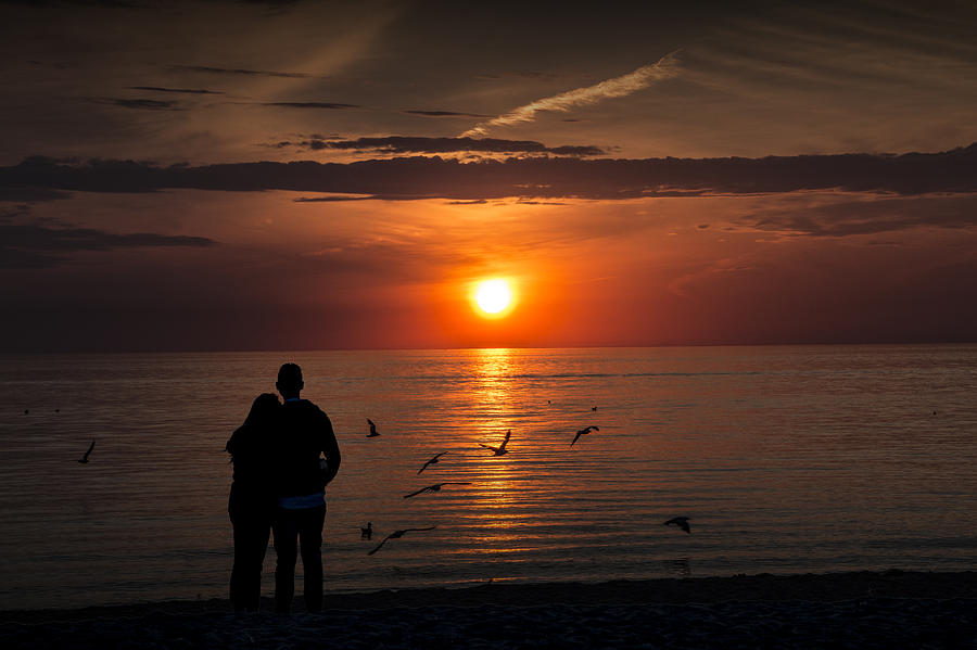 Sunset Photograph - Romantic Couple watching the Days Last Light by Randall Nyhof