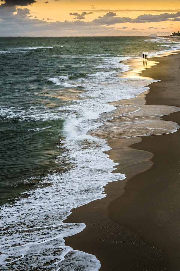 Romantic couple reflection on the beach by Rusty Childress Romantic couple reflection on the beach by Rusty Childress