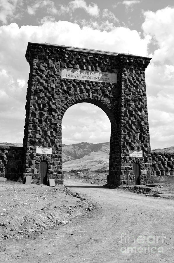 Roosevelt Arch 1903 Gate Old Time Dirt Road Yellowstone National Park Black and White Photograph by Shawn OBrien