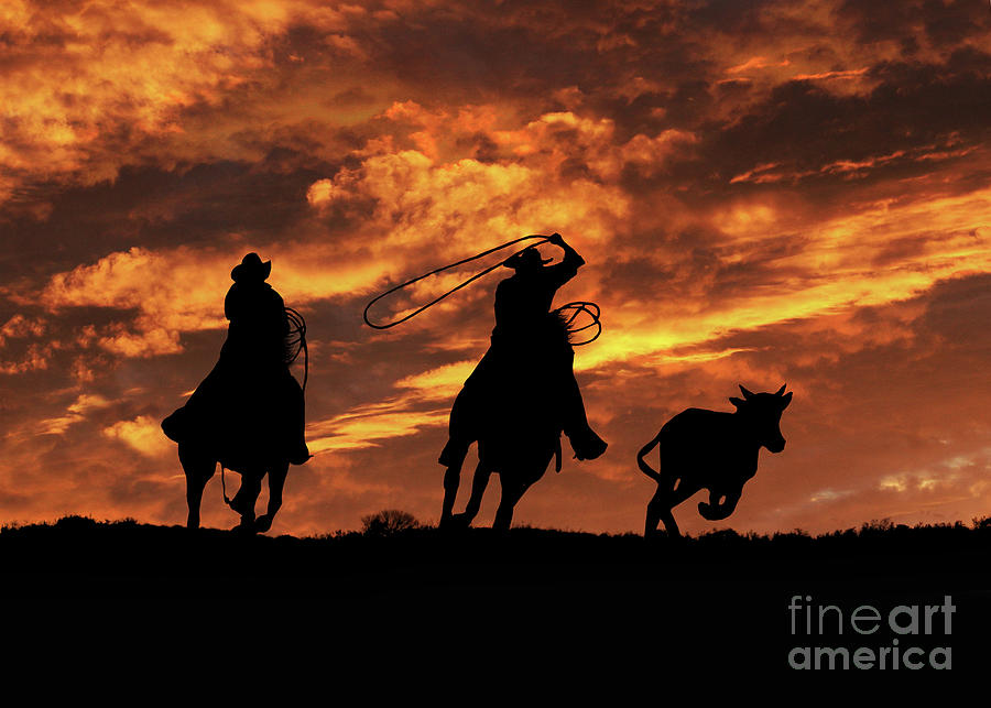 Roping Cowboys and Fiery Skies Photograph by Stephanie Laird