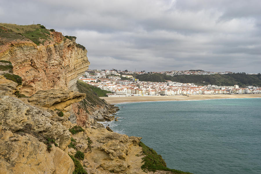 Rough and Moody - Stormy Clifftop View of Nazare Portugal Photograph by Georgia Mizuleva