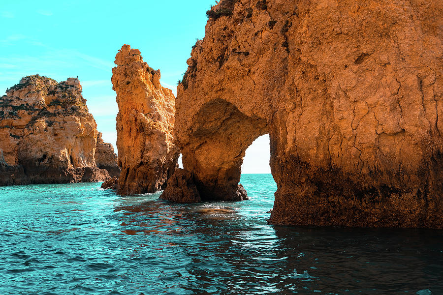 Rough Beauty - Sea Stacks and Natural Arches in Orange and Teal Photograph by Georgia Mizuleva