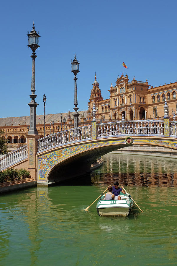 Architecture Photograph - Row Boating in Seville by Carlos Caetano