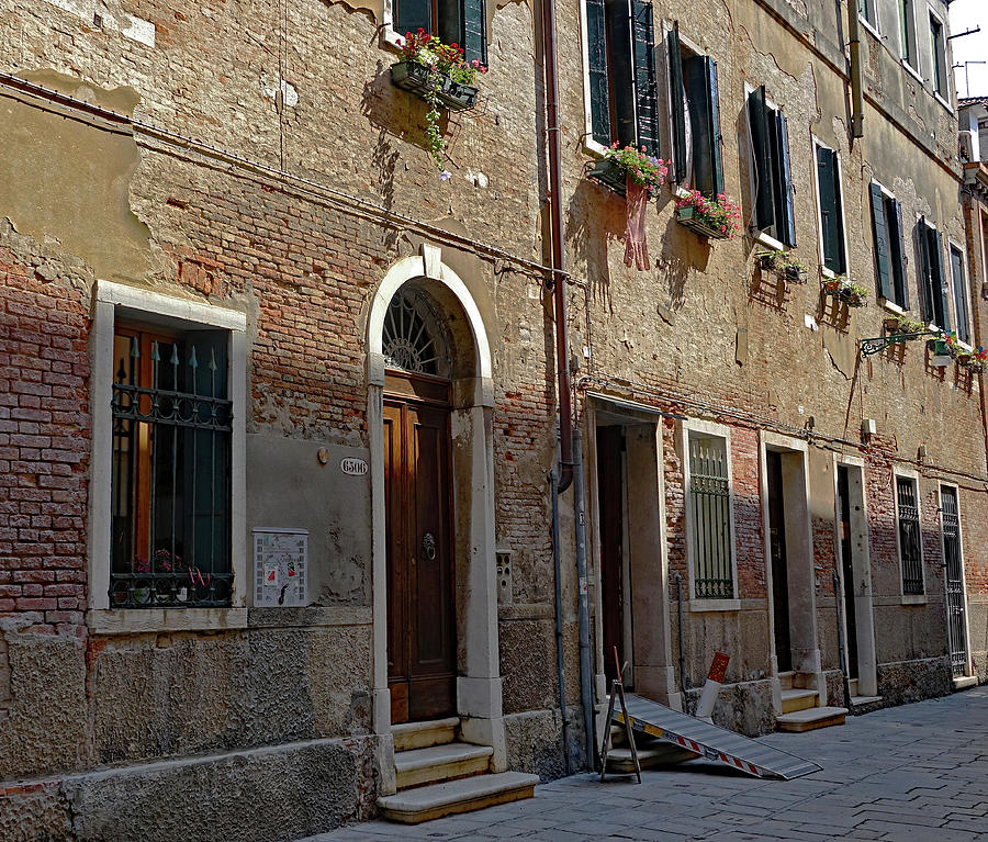 Row Of Apartments In Venice, Italy Photograph by Rick Rosenshein