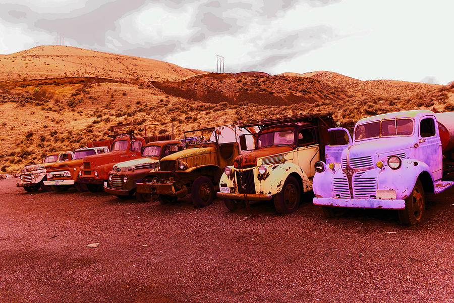 Truck Photograph - Row of rusting history by Jeff Swan
