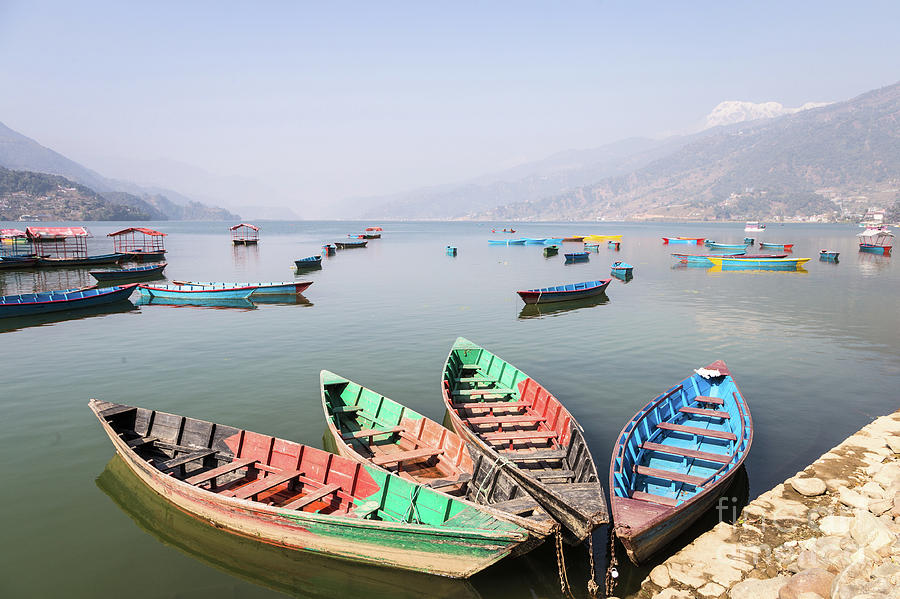 rowbaots in Phewa lake in Pokhara in Nepal Photograph by Didier Marti