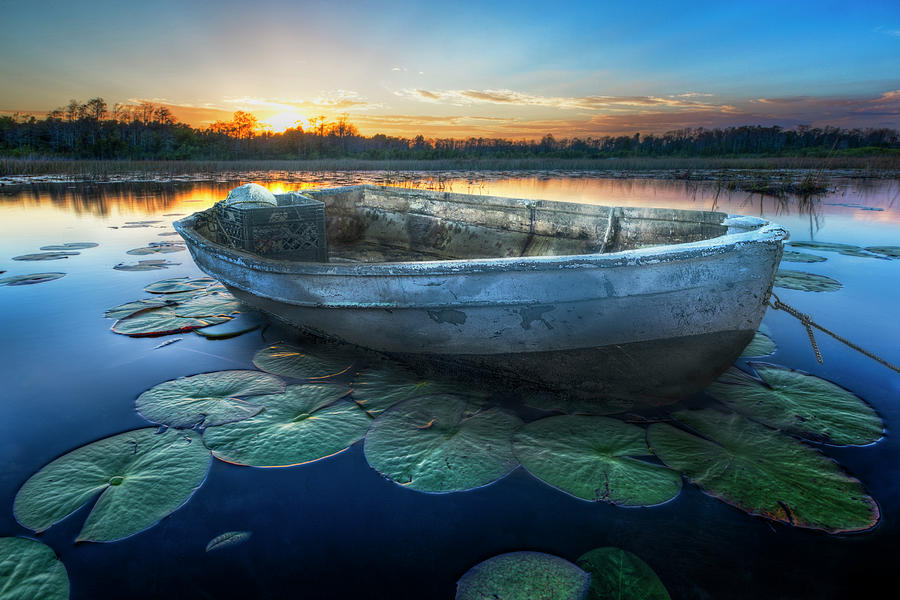 Rowboat at Sunset Photograph by Debra and Dave Vanderlaan