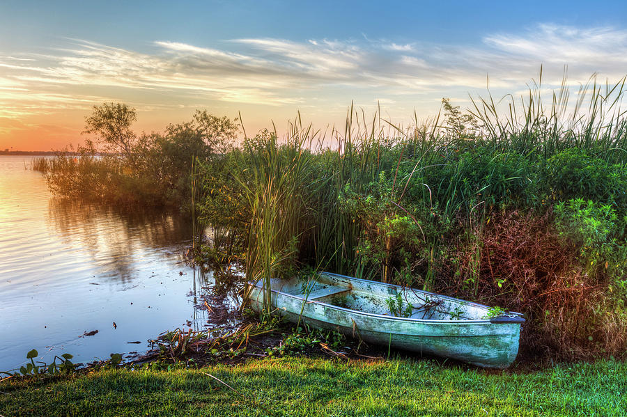Rowboat in the Marsh Photograph by Debra and Dave Vanderlaan