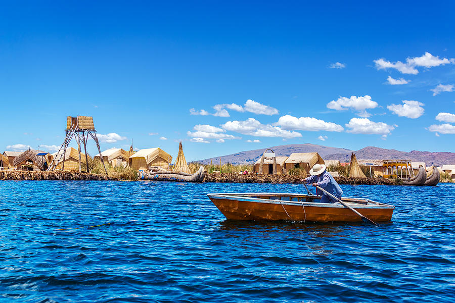 Rowboat on Lake Titicaca Photograph by Jess Kraft