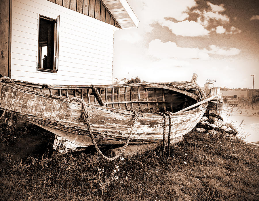 Rowboat Weathered By Time Photograph by Janice Adomeit