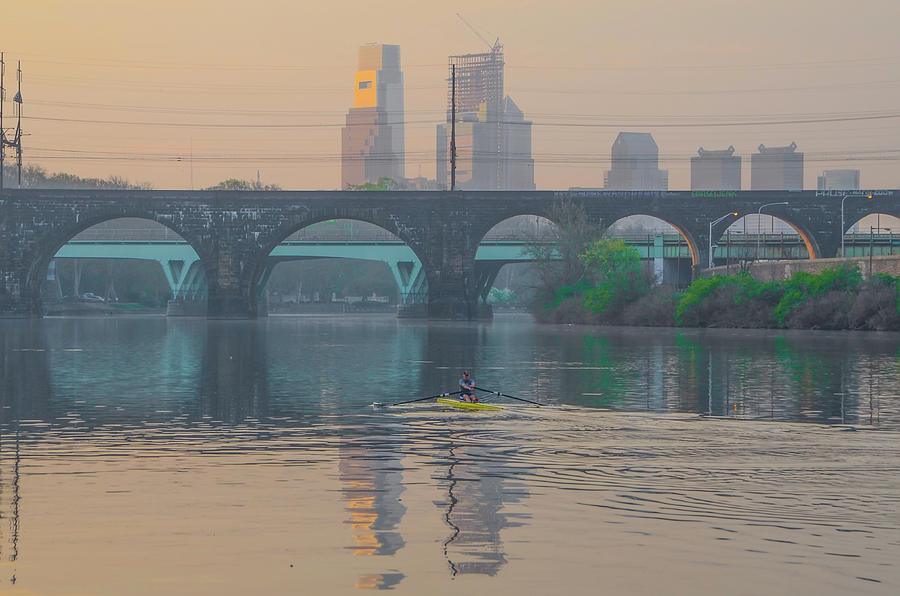 Rowing Photograph - Rowing in the Shaddow of Phildelphia by Bill Cannon