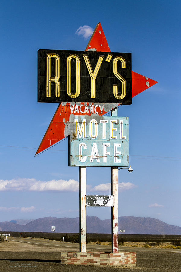 Sign Photograph - Roys Motel ande Cafe by Denise Dube