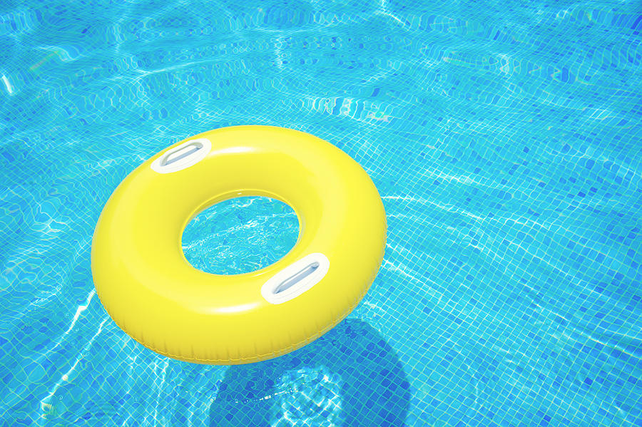 Rubber Ring in Pool Photograph by Anastasy Yarmolovich