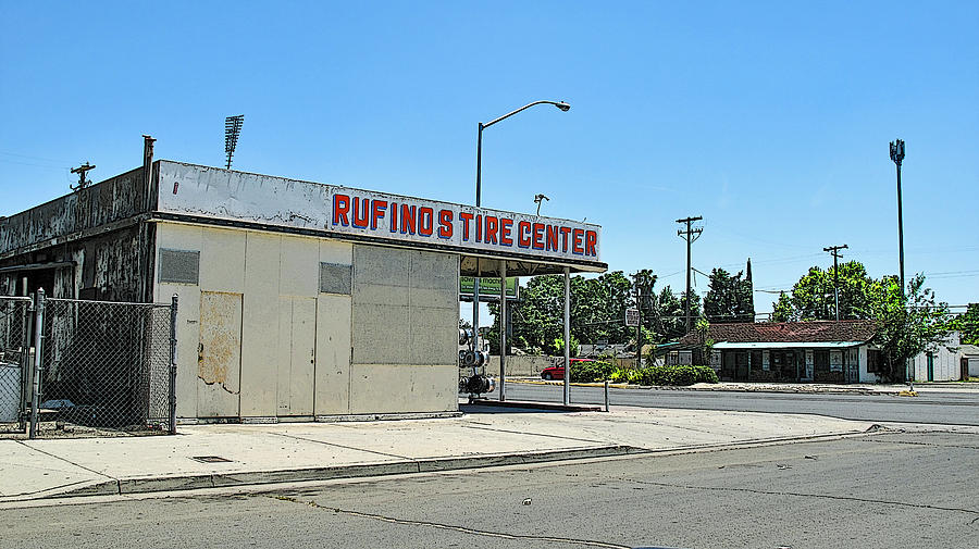 Rufinos Tire Center Photograph by Larry Darnell