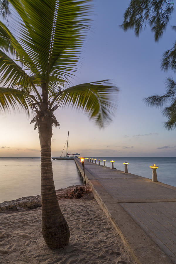 Rum Point Pier at Sunset Photograph by Adam Romanowicz