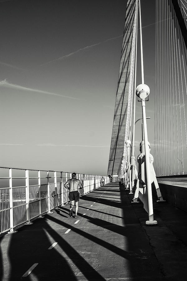 Black And White Photograph - Running the Bridge by Wendy Mogul