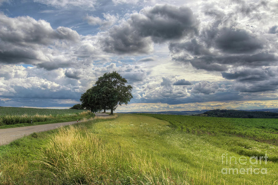 Rural landscape with dramatic sky Photograph by Michal Boubin