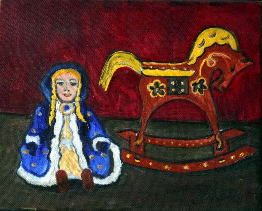doll on rocking horse