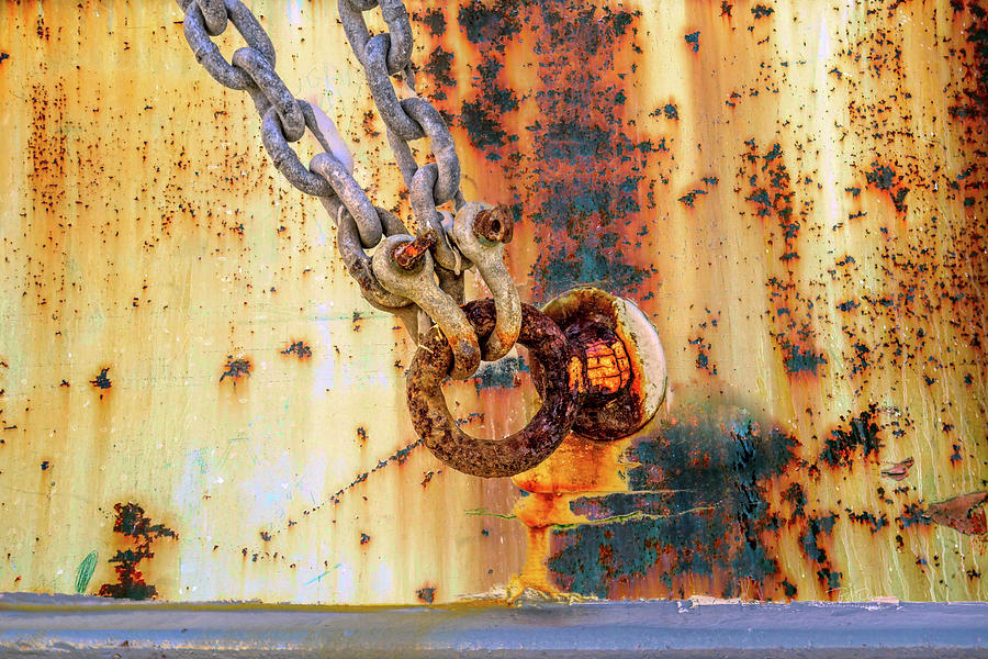Rust and chain Photograph by Bill Posner