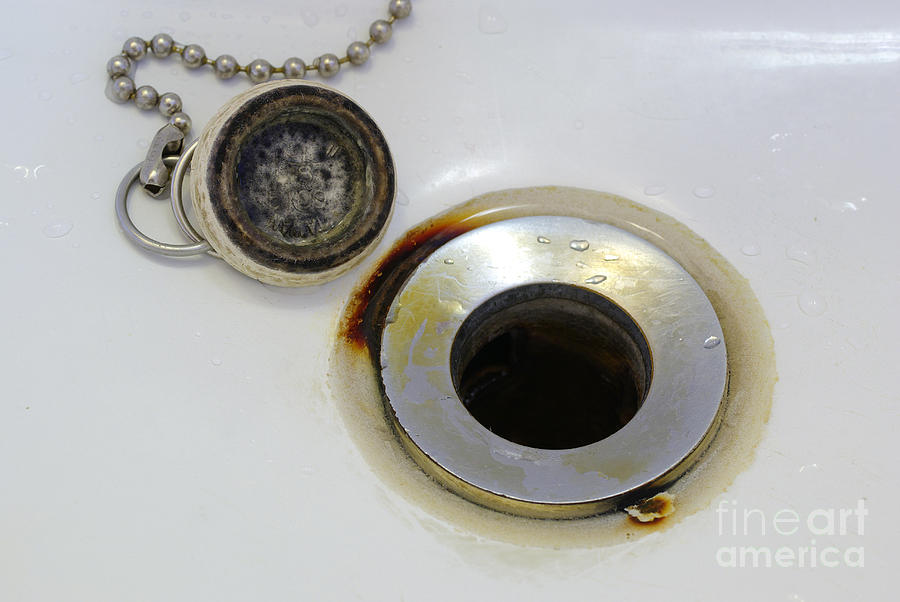 Rust Around Sink Drain Photograph by Scimat